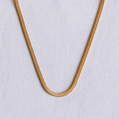 Platte “Snake” ketting 3mm - goudkleur