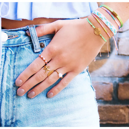 R617 - RVS minimalistische gevlochten ring - goud