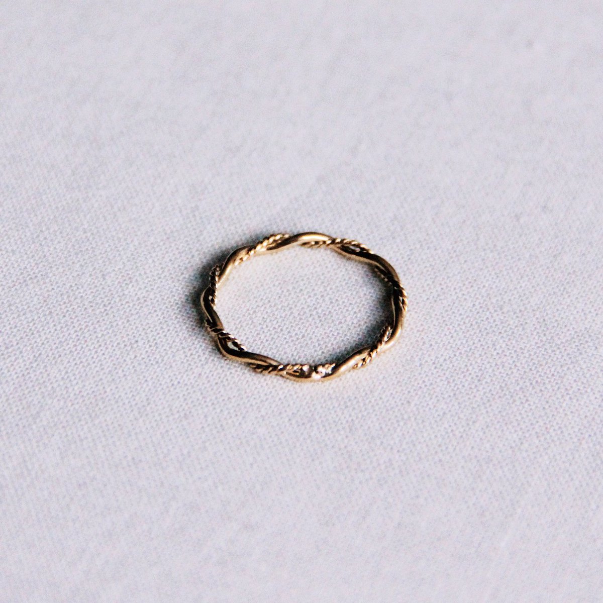 R617 - RVS minimalistische gevlochten ring - goud